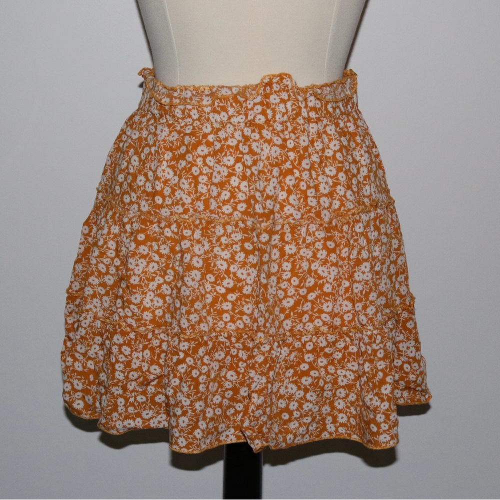 Yellow floral mini skirt with ruffle trim